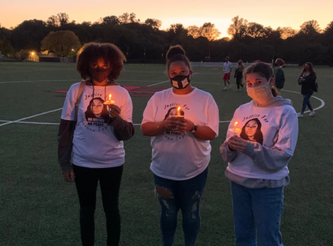 Students Amina West, Kayla Kurtz, and Bryce Carlin attend a vigil on the Friends campus for police shooting victim Breonna Taylor: a peaceful commemoration in a summer when many protests were met with violence. 