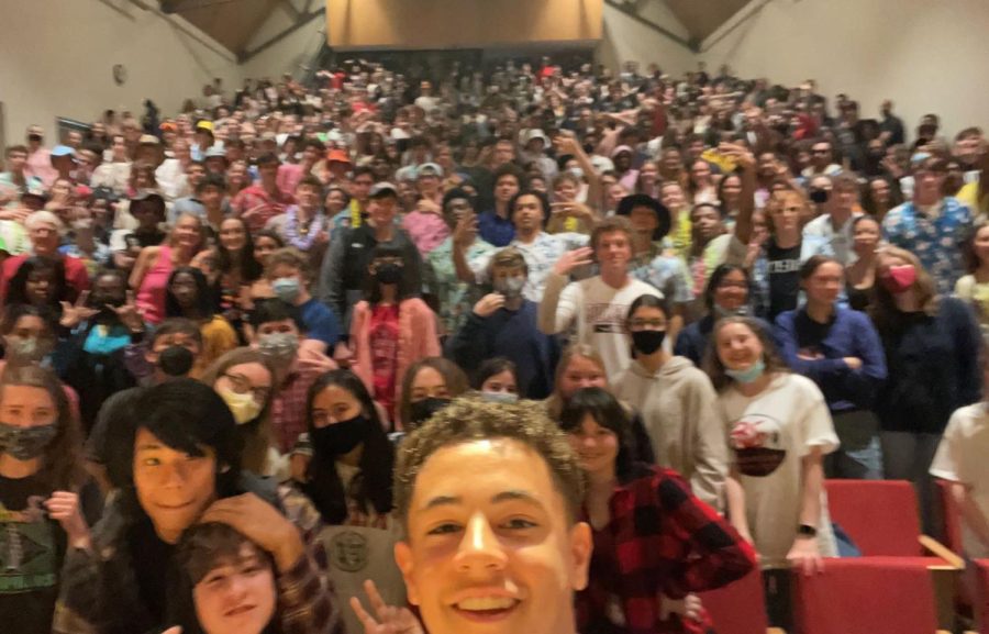 Senate co-president Owen Burns snaps a selfie with the Friends student body on his last day of collection, May 3, 2022.