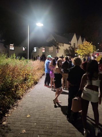 Upper School students wait in line for snacks and admission to the 2022 homecoming dance.