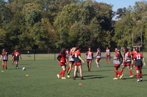 Girls Varsity Soccer celebrated a shutout against City on Scarlet & Gray Day 2022.