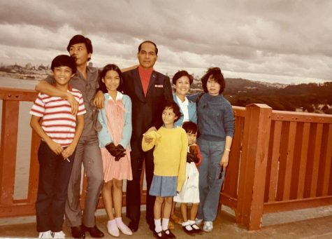 My mothers family on the Golden Gate Bridge shortly after they moved to America. My mom is third from the left, in the pink dress.