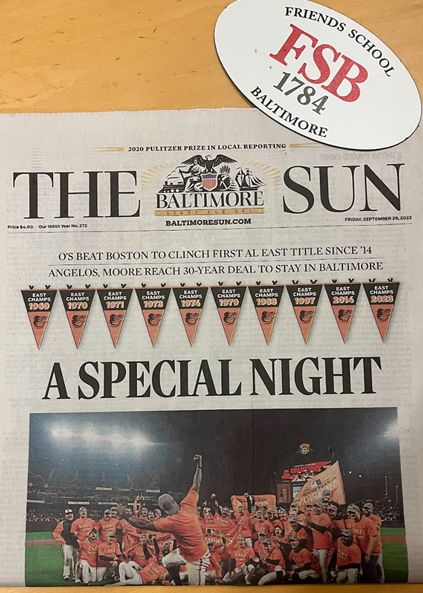 In Orioles fan and 12th grade dean Josh Carlins office, Friends memorabilia and a recent Baltimore Sun front page celebrating the teams winning season have pride of place.