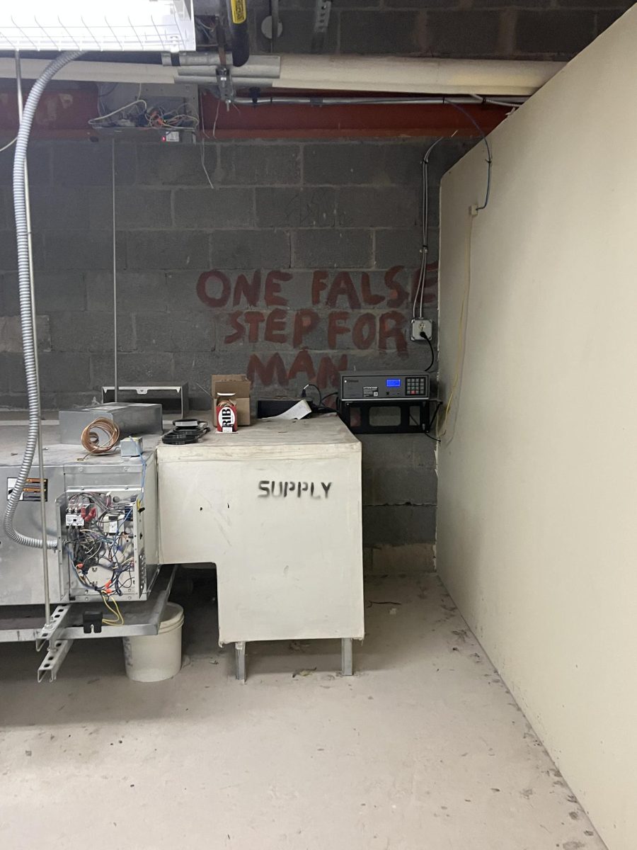 In the old scene shop, in the ceiling outside of Helen Berkeley's English classroom, some walls still have student graffiti from years past.