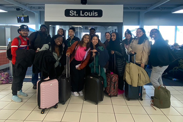 Friends students and staff pause for a photo en route to this years Student Diversity Leadership Conference in St. Louis.