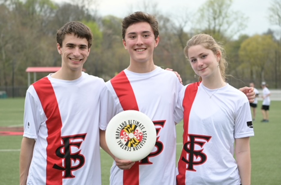 Ultimate co-captains Ben Lopez, Noah Sheasby, and Tess Porter pose before a match.