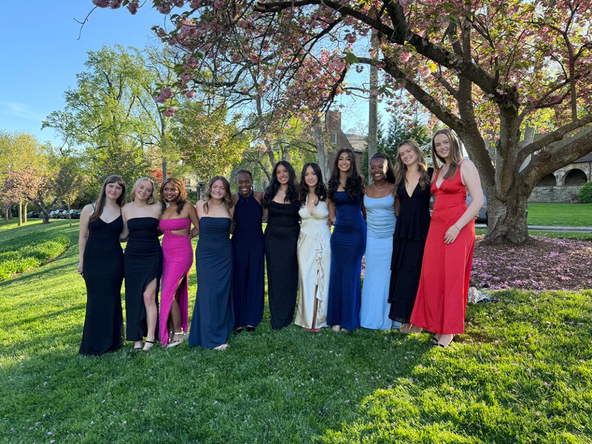 Members of Friends Schools class of 2025 pose for a photo before their first prom.