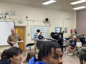 New Concert Chorale presidents Henry Turner and Elaina Pearce were hard at work in front of the full chorus on Monday, as teachers Michael McVey and Mat Lane led the group through its new music.