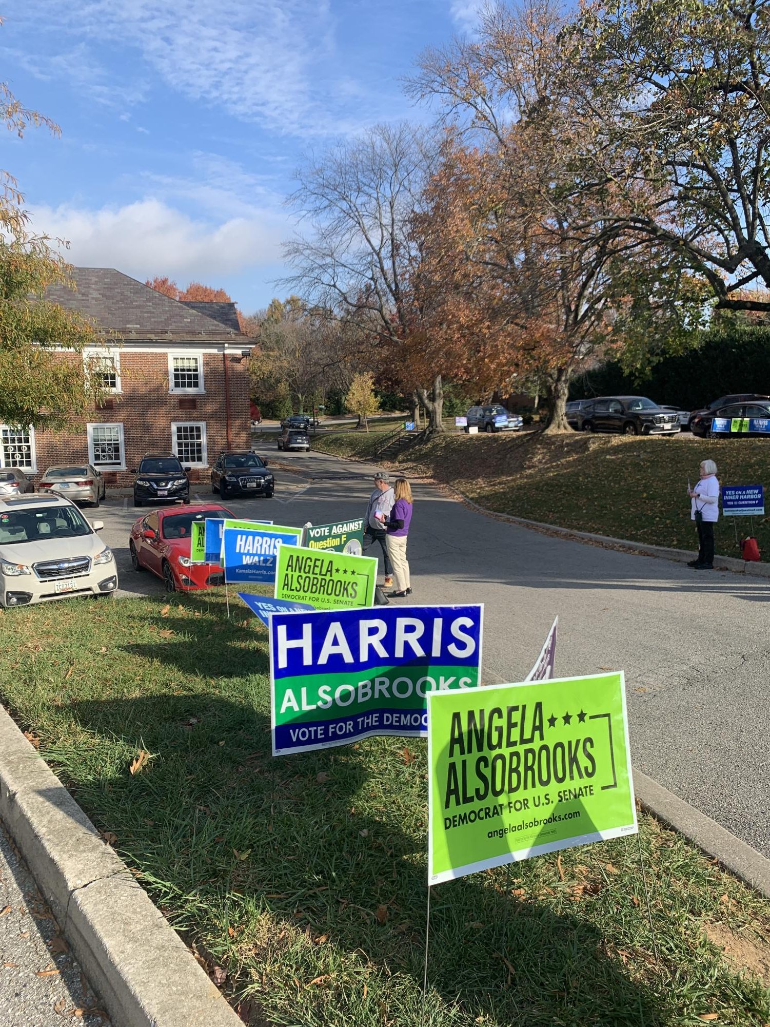 Signs lined a driveway connecting two parking lots outside the polling place - safely behind a sign that read "No Electioneering Beyond This Point."