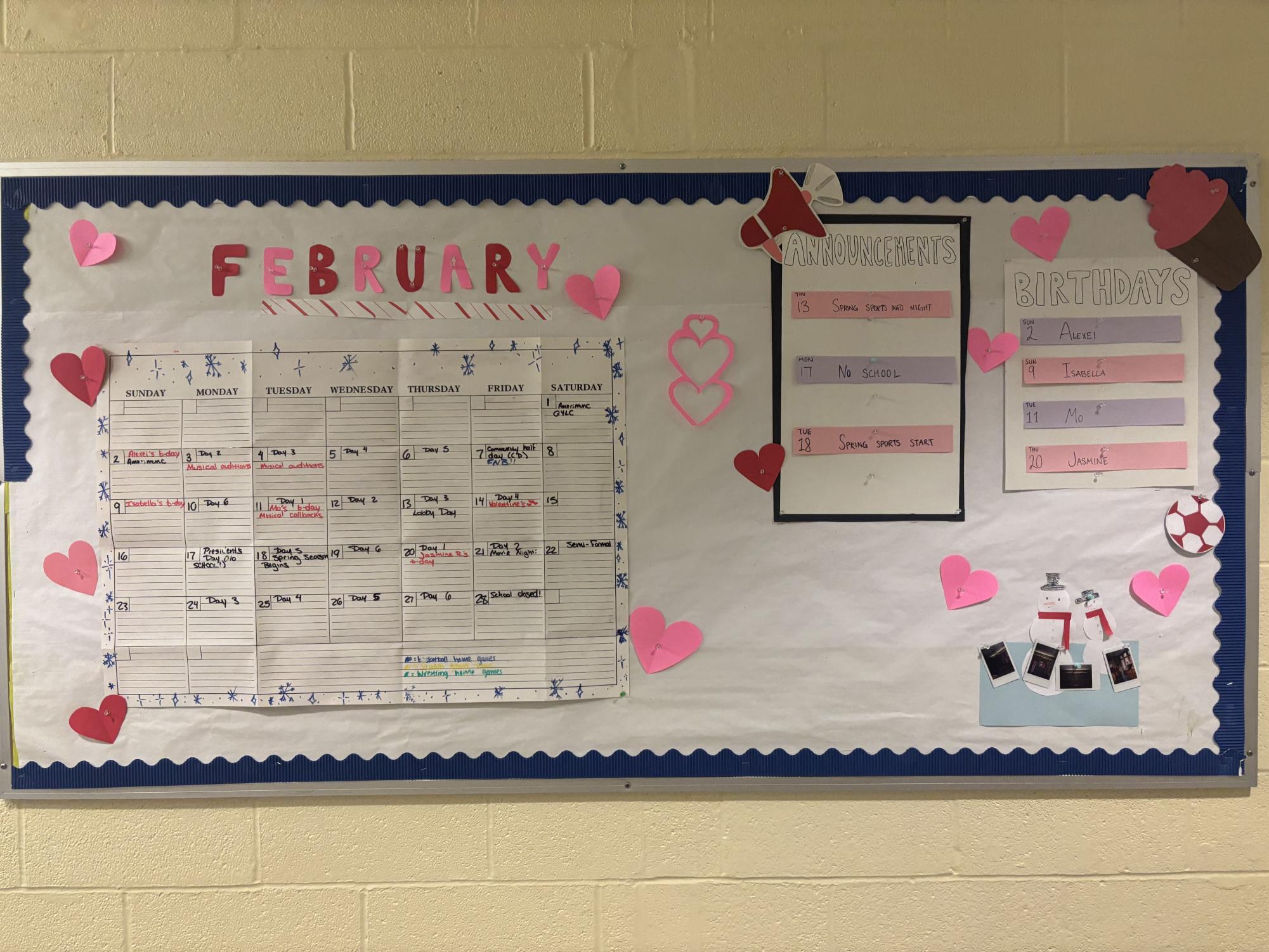 A bulletin board in the Science/Math building celebrates Valentine's Day and February birthdays.