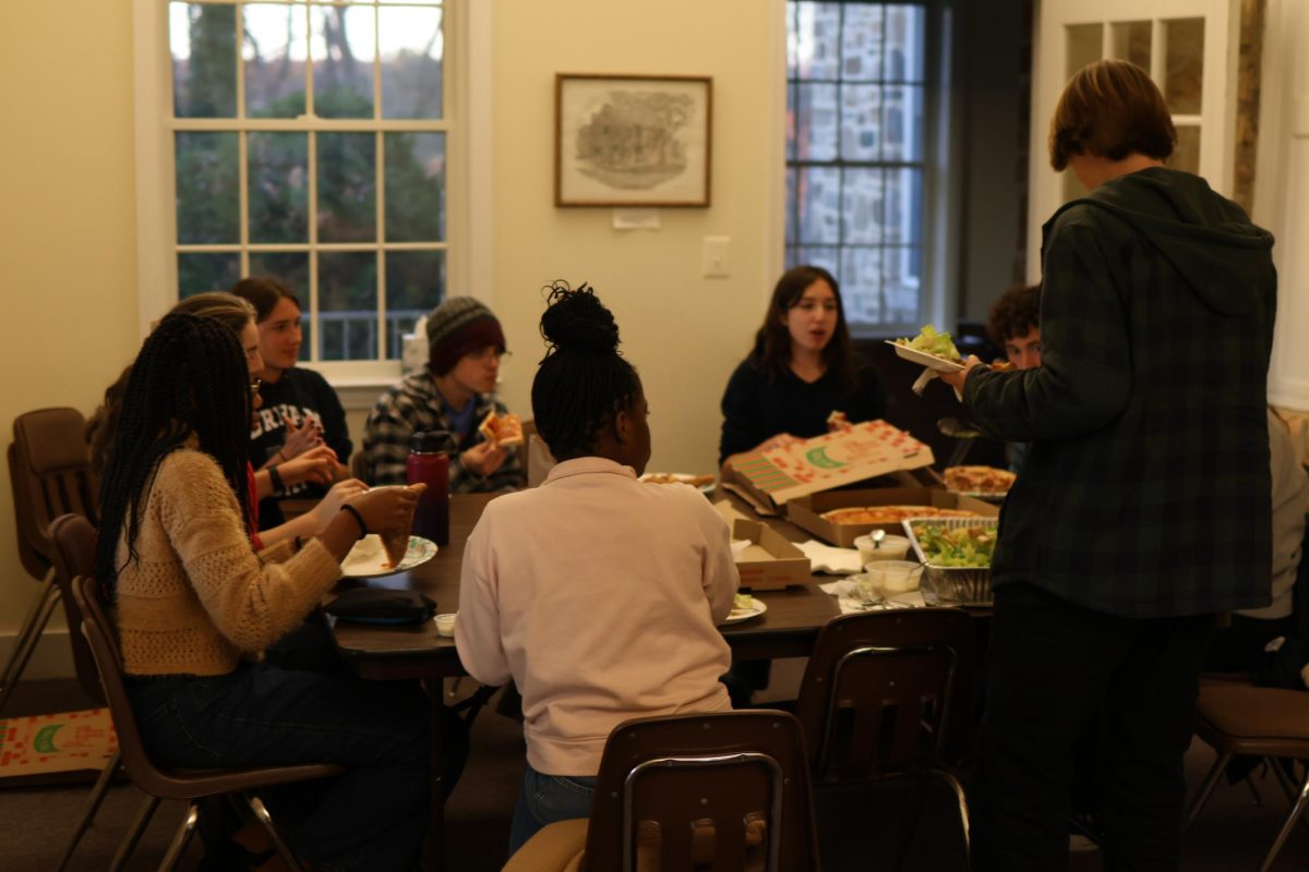 Quaker Student Union members share a meal while on their annual retreat at Gunpowder Friends Meeting.