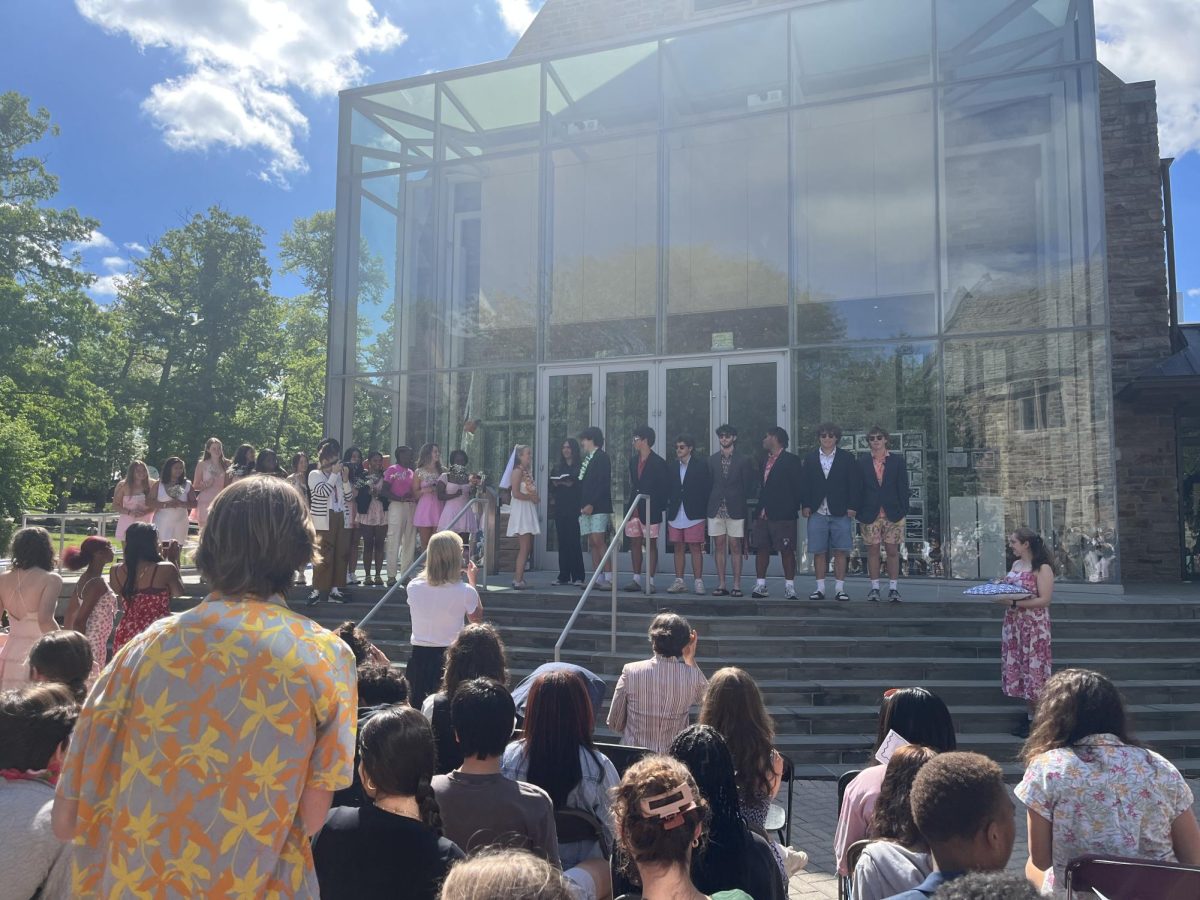 With friends as attendants, parents snapping photos, and the whole Upper School watching, seniors Elaina Pearce and Ramsey Kissack wed in a mock ceremony officiated by classmate Vanya Gurachevsky.