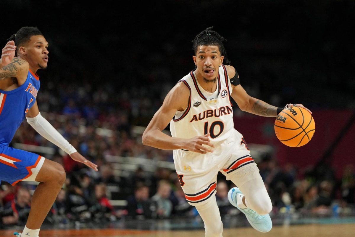 Auburn Tigers guard Chad Baker-Mazara drives to the basket against the Florida Gators during the semifinals of the men's Final Four of the 2025 NCAA Tournament in April.
