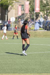 Senior Daryn Barnes takes the field between rain delays.