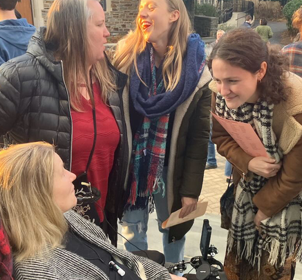 Koniezhny and Isabel Cooke talk in the Upper School quad with language department colleagues Lee Roby and Marta Reinaldo.